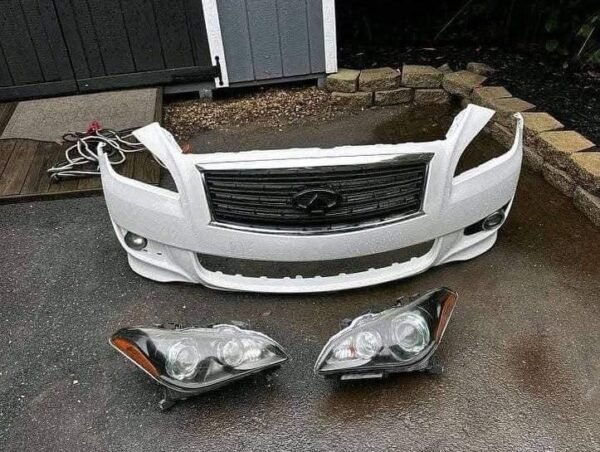 Primed SPORT bumper and Black bezel Headlights